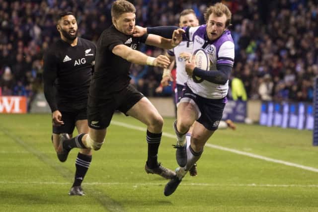 Scotland's Stuart Hogg (right) dazzled in the narrow defeat to New Zealand. Picture: SNS