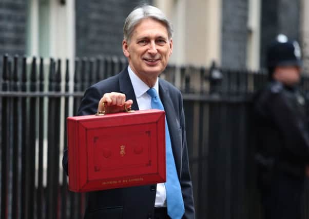 Philip Hammond raised the 40 per cent income tax threshold in England and Wales. Picture: Getty Images