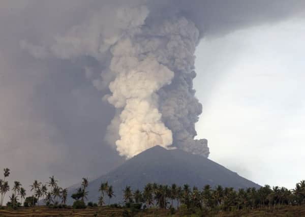 A view of the Mount Agung volcano erupting in Karangasem, Bali. Picture: AP Photo/Firdia Lisnawati