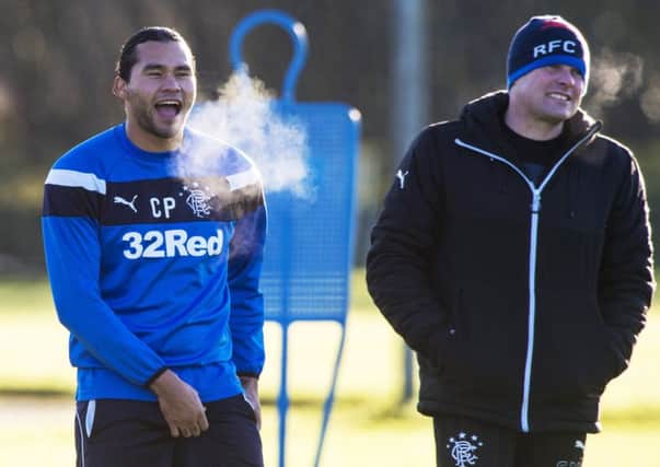 Carlos Pena, seen here with Graeme Murty, is back in the Rangers matchday squad for the first time in over a month. Picture: SNS Group