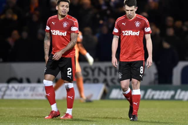 James Tavernier (left) and Ryan Jack look downcast after the second Dundee goal goes in. Picture: SNS Group