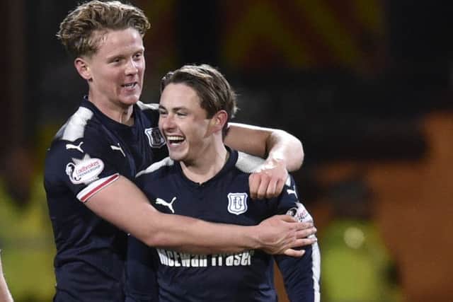 Mark O'Hara and Scott Allan celebrate the second goal. Picture: SNS Group