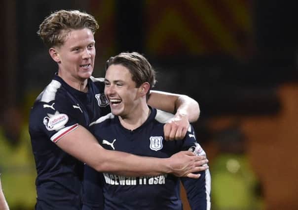 Mark O'Hara and Scott Allan celebrate the second goal. Picture: SNS Group