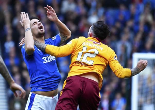 Motherwell's Ryan Bowman's challenge on Fabio Cardoso left the Rangers defender with a broken nose in the Betfred Cup semi-final. Picture: Rob Casey/SNS