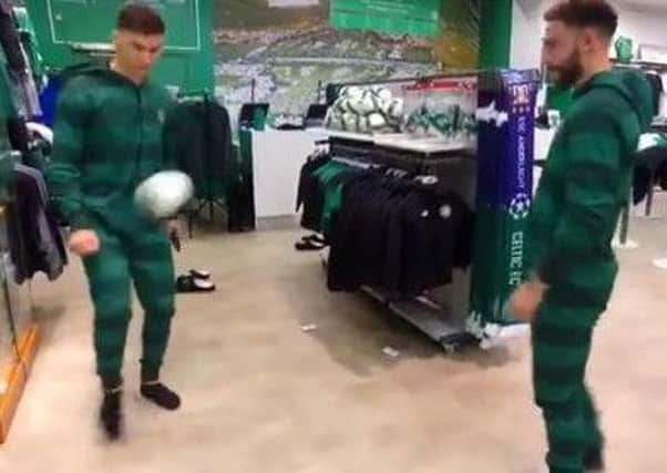 Kieran Tierney and Patrick Roberts keep the ball up in their Celtic onesies.