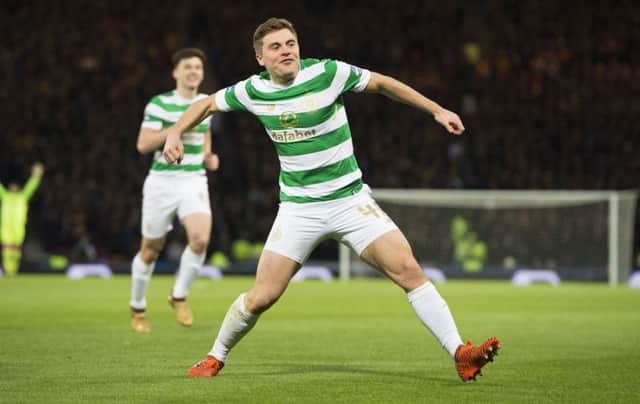 Celtic's James Forrest celebrates his goal to make it 1-0. Picture: SNS