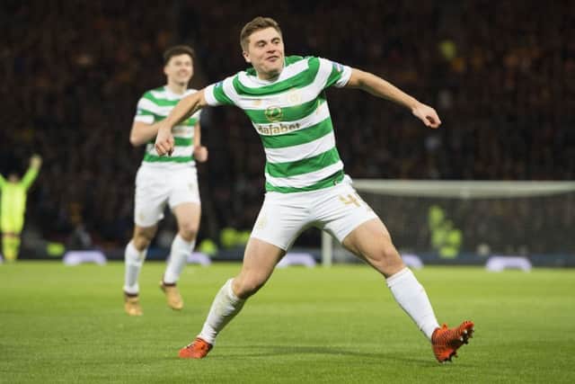 Celtic's James Forrest celebrates his goal to make it 1-0. Picture: SNS