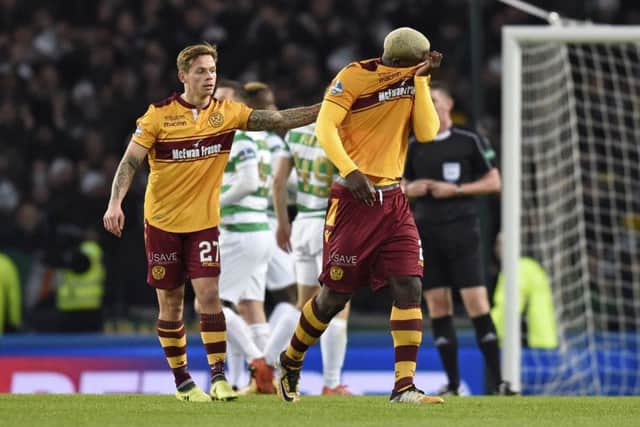 A visibly upset Cedric Kipre leaves the field after being sent off. Picture: SNS