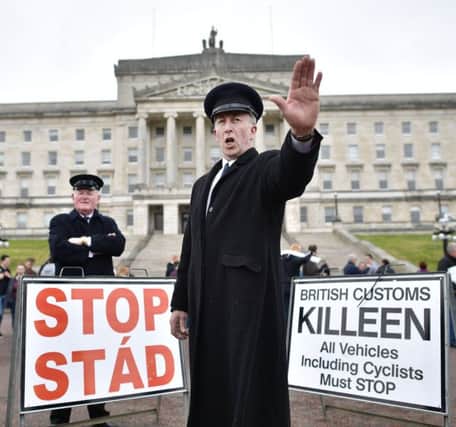 Protests outside the Northern Irish parliament.  (Photo by Charles McQuillan/Getty Images)