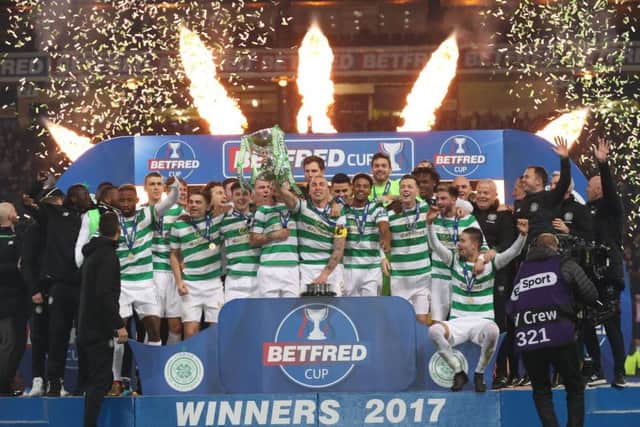 Celtic lift the Betfred Cup after defeating Motherwell at Hampden Park. Picture: Getty