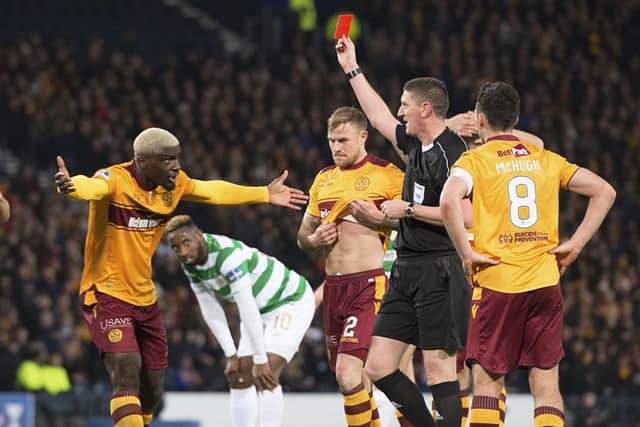 Referee Craig Thomson shows Cedric Kipre a red card. Picture: SNS