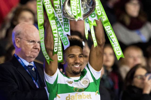 Scott Sinclair lifts the cup but there were doubts over his penalty claim. Picture: SNS