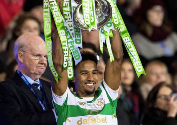 Scott Sinclair lifts the cup but there were doubts over his penalty claim. Picture: SNS
