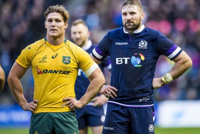 The two captains, Michael Hooper (left) and John Barclay, look on during the 53-24 victory for Scotland. Picture: SNS Group