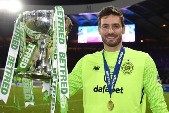 Celtic goalkeeper Craig Gordon with the Betfred Cup. Picture: Rob Casey/SNS