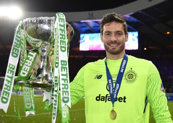 Celtic goalkeeper Craig Gordon with the Betfred Cup. Picture: Rob Casey/SNS