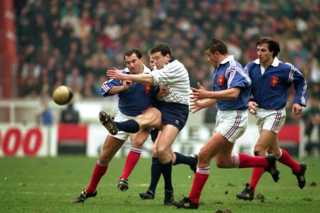 Scott Hastings kicks for touch, despite the attentions of Thierry Lacroix and Philippe Bennetton during the France v Scotland Five Nations match at the Parc des Princes in 1993. Picture: TSPL