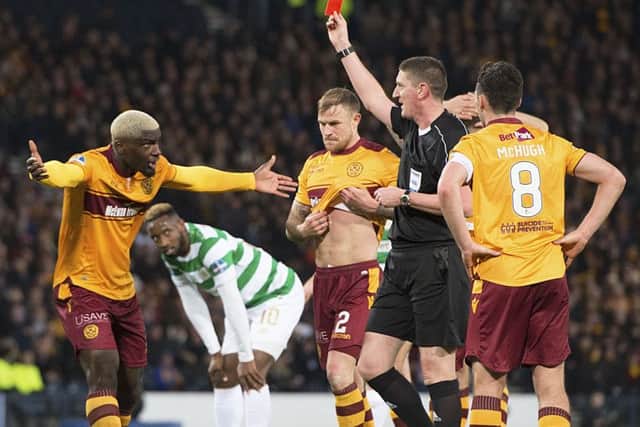 Referee Craig Thomson shows Cedric Kipre a red card in the Betfred Cup final. Picture: SNS