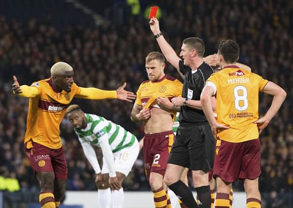 Referee Craig Thomson shows Cedric Kipre a red card in the Betfred Cup final. Picture: SNS