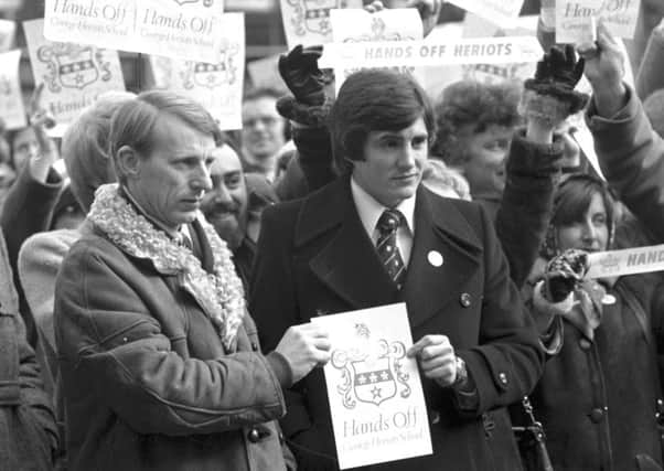 Rugby players Ken Scotland and Andy Irvine join a 'Hands Off Heriot's' demonstration in 1979 (Denis Satraughan)