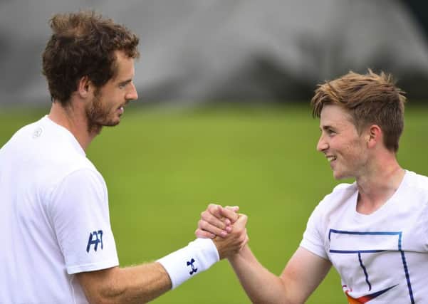 Andy Murray with Aiden McHugh,
Photo by Javier Garcia/BPI/REX/Shutterstock