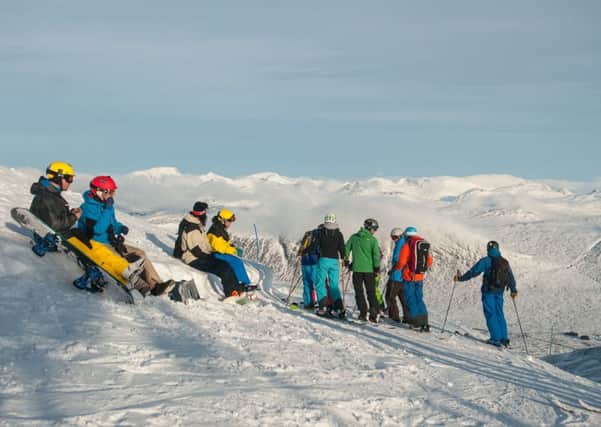 Skiers and Snowboarders at the top of the Main Basin at Glencoe Mountain