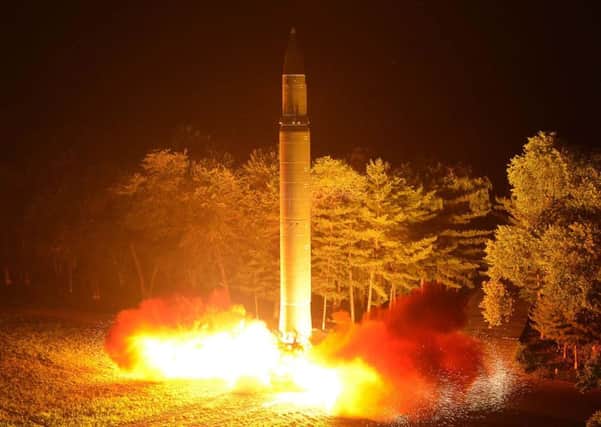 North Korea's Hwasong intercontinental ballistic missile is lauched at an undisclosed location. Picture: AFP/KCNA VIS KNS.