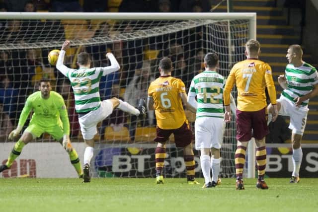 Celtic's Mikael Lustig knocks the ball into the back of his own net. Picture: PA