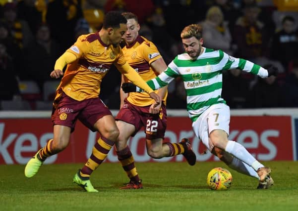 Patrick Roberts takes on Motherwell's Charles Dunne. Picture: SNS Group