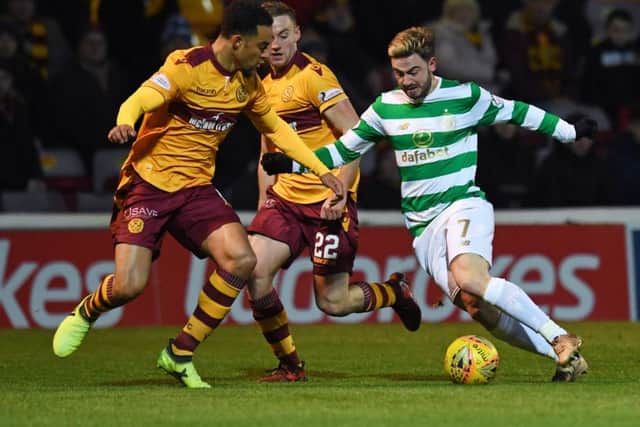 Patrick Roberts takes on Motherwell's Charles Dunne. Picture: SNS Group