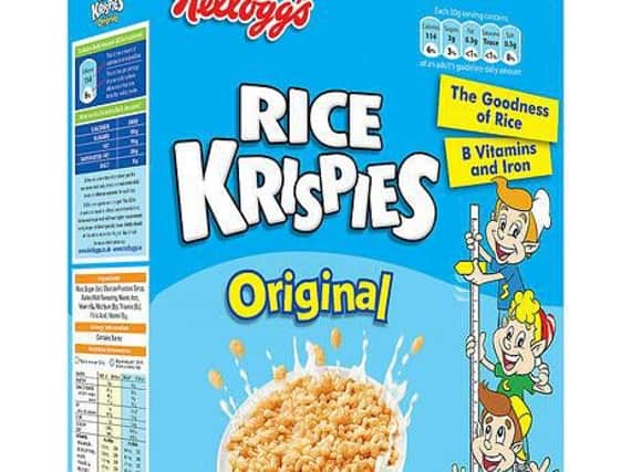 Kellogg's is to slash the amount of sugar in three of its cereals eaten by children by at least a fifth.
