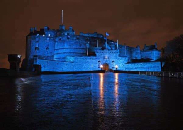 Edinburgh Castle and buildings across Scotland are being lit up to mark St Andrew's Day. Picture TSPL