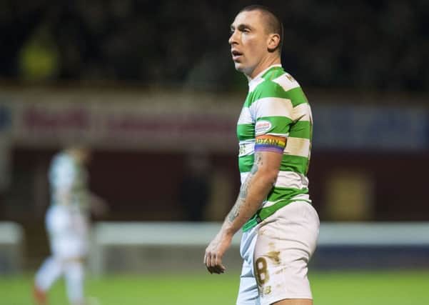 Scott Brown has claimed that Celtic players have coins thrown at them 'nearly every week'. Picture: SNS Group