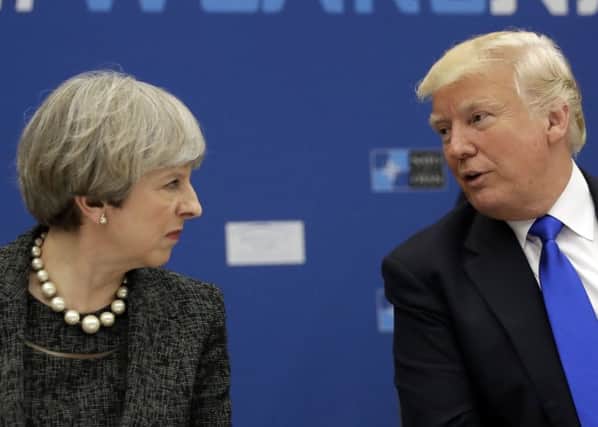 Donald Trump initially responded to May's criticism of his retweeting of inflammatory anti-Muslim videos from a fringe British political group by directing his message to the wrong Theresa May. Picture: AP Photo/Matt Dunham, Pool, File
