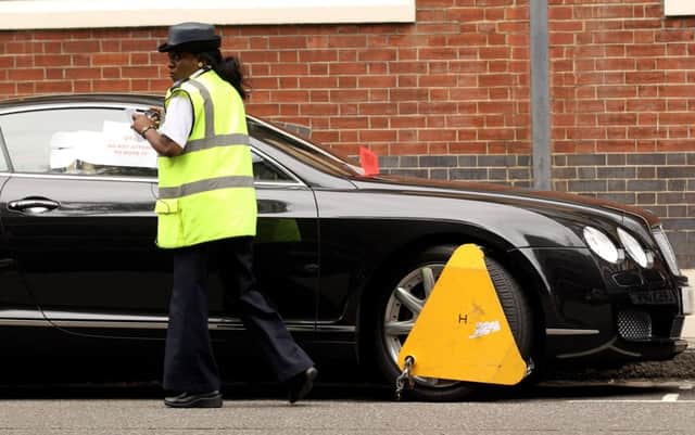 Drivers who have neglected to pay outstanding fines are facing having their vehicles clamped. Picture: Getty