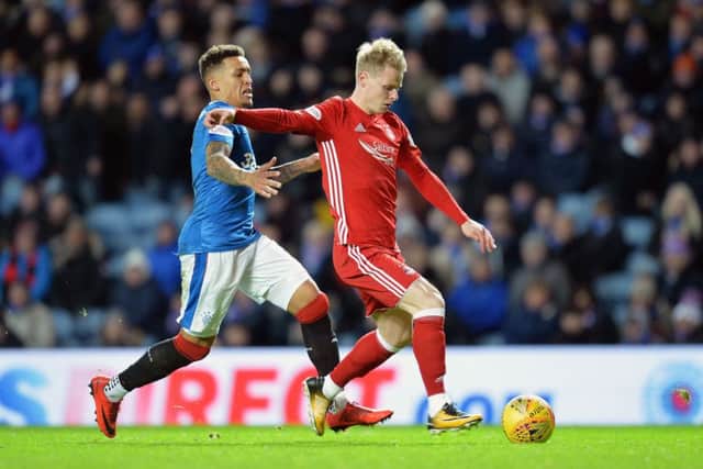 Aberdeen's Gary Mackay-Steven is challenged by Rangers' James Tavernier. Picture: PA