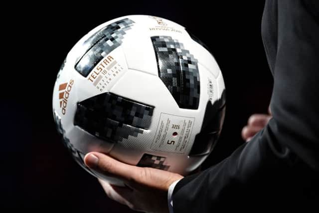 The official ball, named Telstar 18, is presented during the 2018 FIFA World Cup football tournament final draw. Picture: AFP/Getty Images