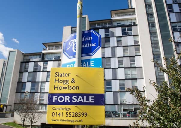 A for-sale sign in Glasgow. (Picture: John Devlin)