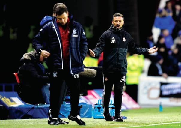 Aberdeen manager Derek McInnes on the touchline with Rangers' Graeme Murty during Wednesday's match at Ibrox. Picture: Rob Casey/SNS