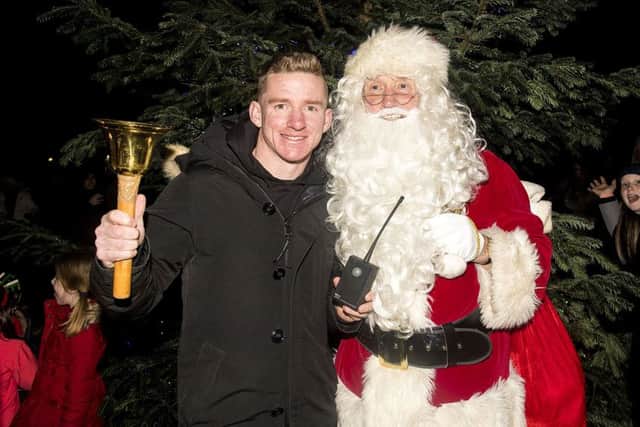 01/12/17
 LENNOXTOWN 
 Celtic's Jonny Hayes turns on the Christmas lights at their Lennoxtown training base