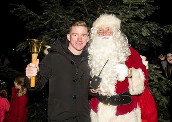 01/12/17
 LENNOXTOWN 
 Celtic's Jonny Hayes turns on the Christmas lights at their Lennoxtown training base