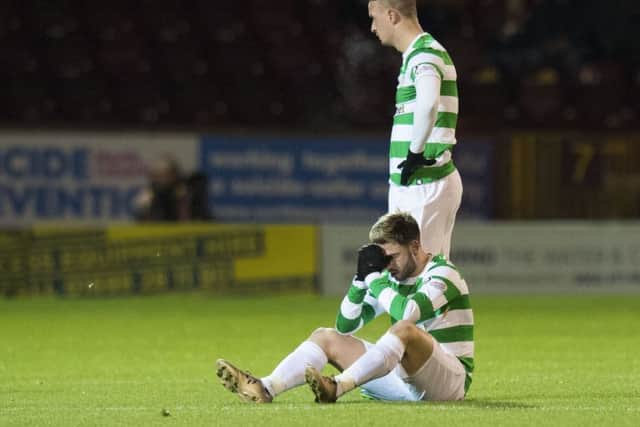 Celtic's Patrick Roberts is left frustrated after picking up an injury. Picture: SNS/Ross Parker