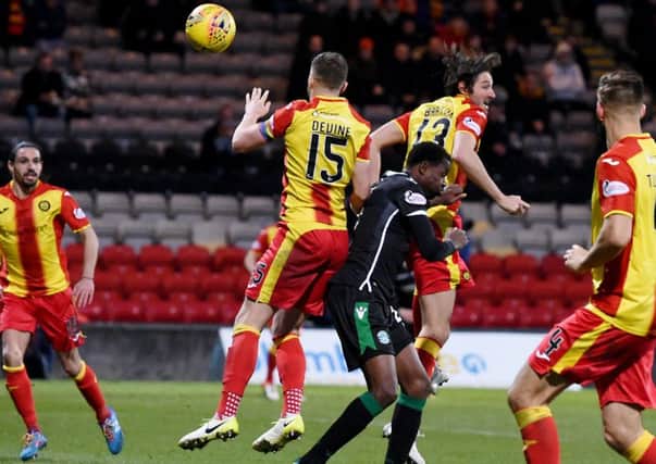 Partick Thistle's Adam Barton heads into his own net. Picture: SNS/Gary Hutchison