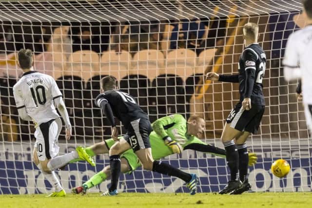 Dumbarton's Tom Walsh scores to make it 1-0. Picture: SNS/Roddy Scott