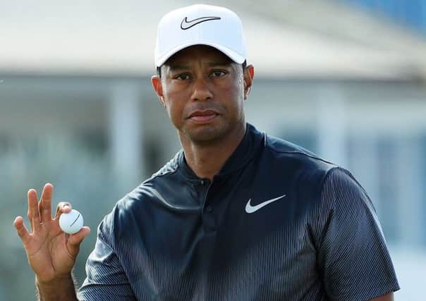 Tiger Woods reacts to his par on the fifth green during the third round of the Hero World Challenge in the Bahama. Picture: Mike Ehrmann/Getty Images