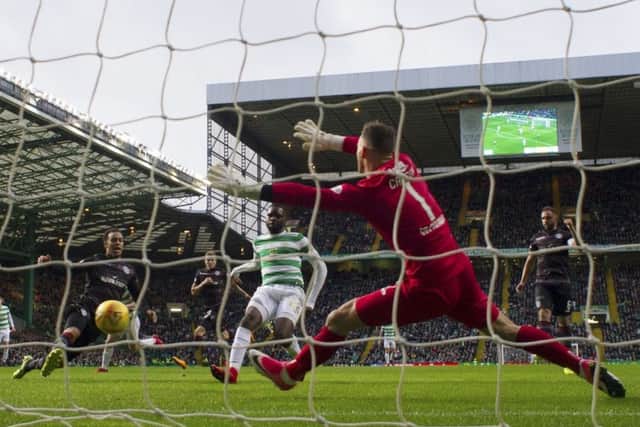 Odsonne Edouard slots in the opening goal for Celtic against Motherwell. Picture: SNS.