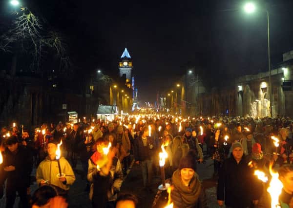 The torchlight procession has become one of the major attractions of the Hogmanay programme of events in Edinburgh.