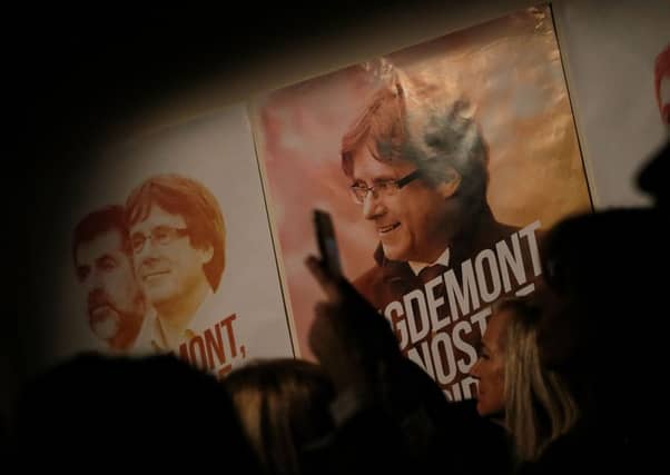 People attend the program presentation of Catalan pro-independence center-right grouping 'Junts per Catalunya - JUNTSXCAT' (All for Catalonia). Picture: Getty Images