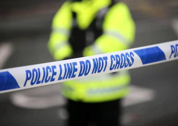 A murder probe is under way after a body of a woman was ofund in a falt in Glasgow. Picture: Christopher Furlong/Getty Images