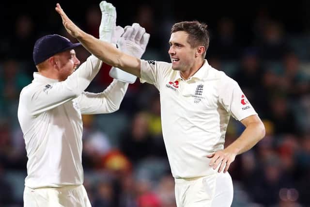 England's Chris Woakes celebrates taking the wicket of Steve Smith. Picture: Mark Kolbe/Getty Images
